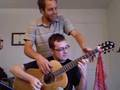 A deux sur une guitare